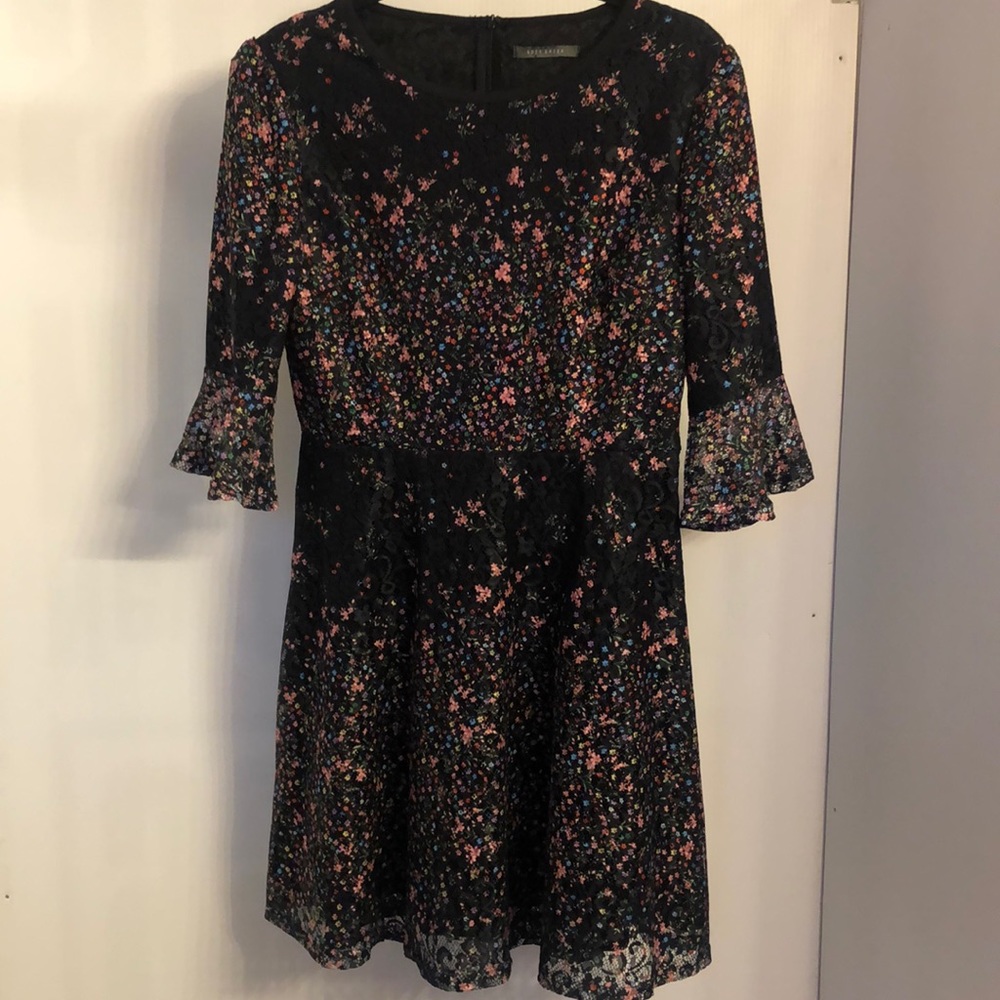 Suzy Shier Sz M. Dress . Good condition. Black with adorable floral desi…